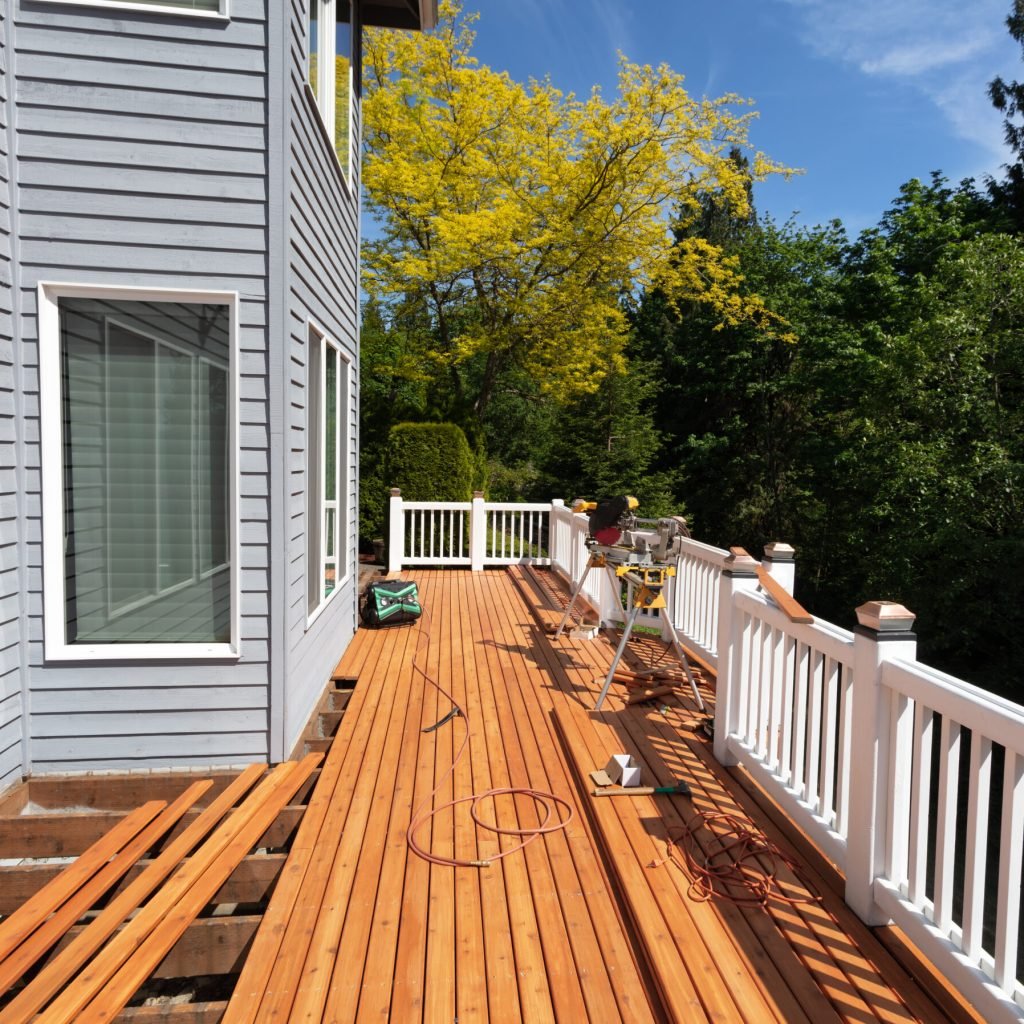 Outdoor,Wooden,Deck,Being,Remodeled,With,New,Red,Cedar,Wood